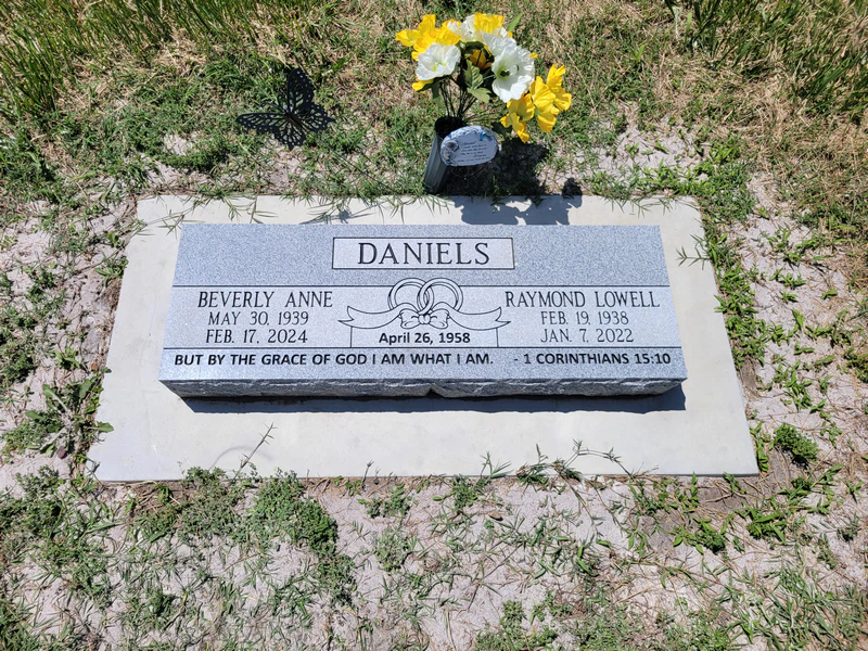 Grey granite companion bevel marker carved with wedding rings and a verse
